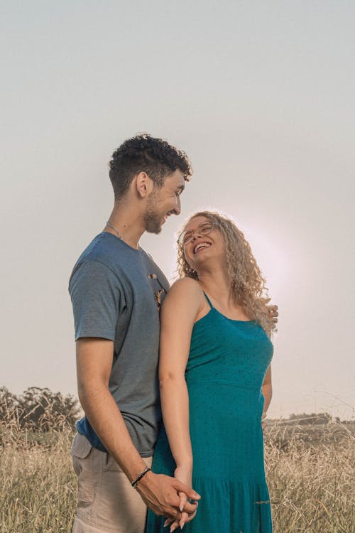 Cheerful Man and Woman in Countryside