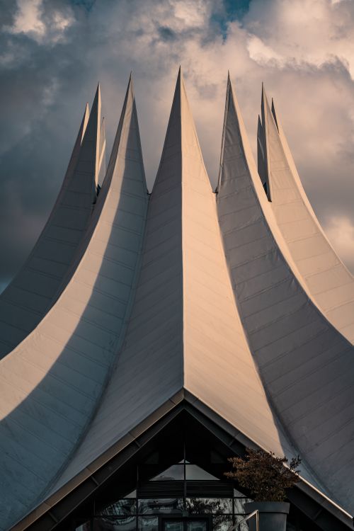Free Explore the iconic Tempodrom spires against a dramatic sky in Berlin, Germany. Stock Photo