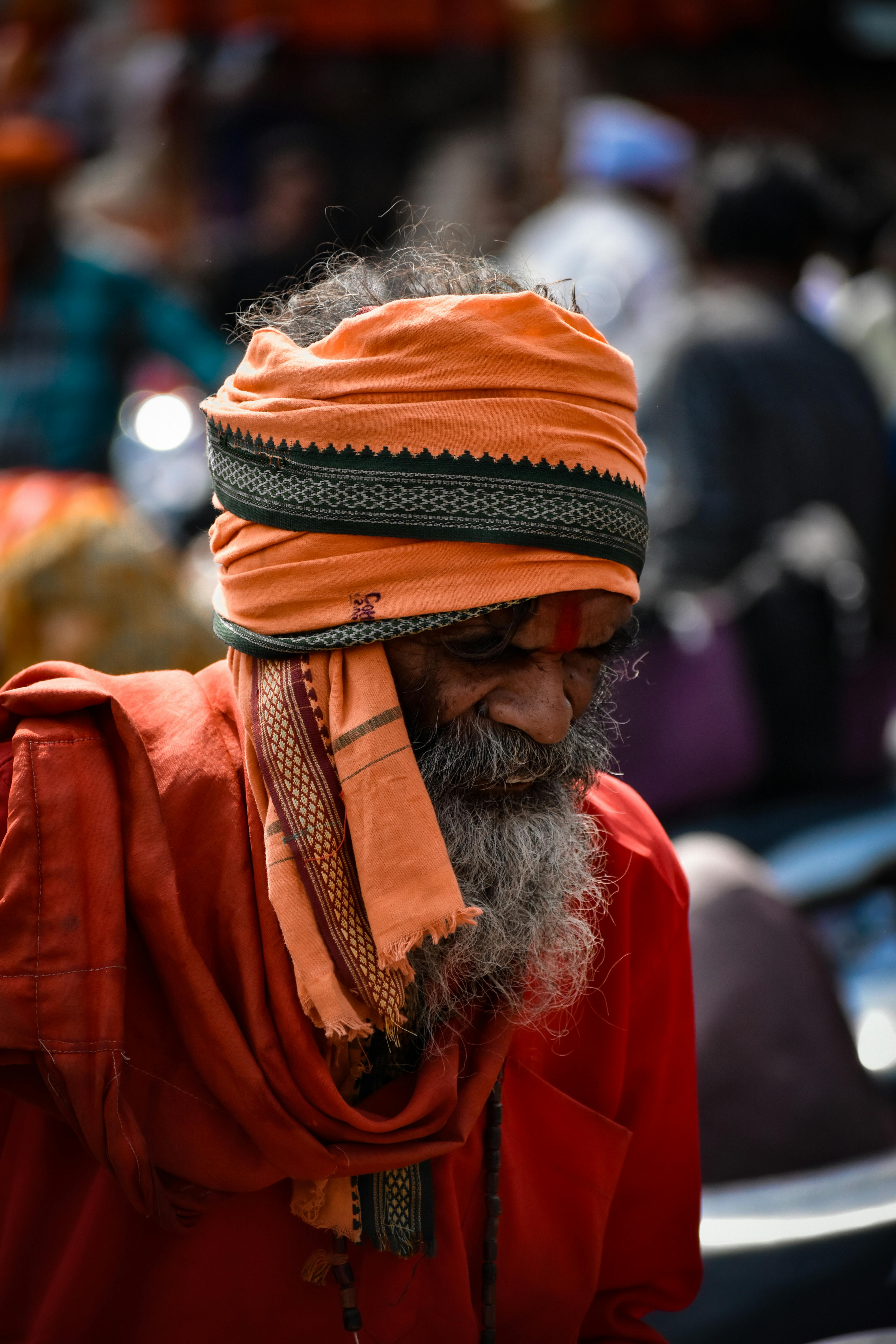 Premium Photo | Portrait of a seated old sadhu generative ai