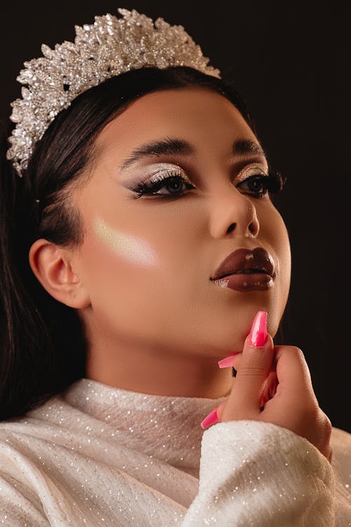 Young Woman Wearing Glamour Makeup and a Tiara 