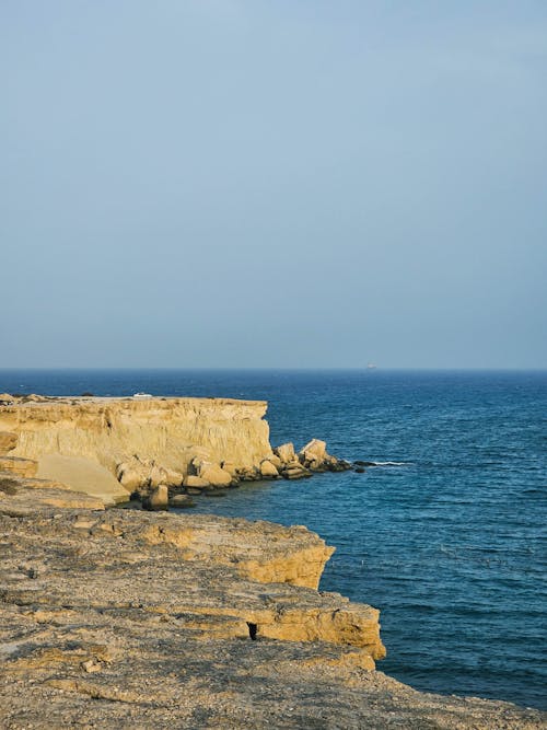 Photos gratuites de cailloux, eau, falaise