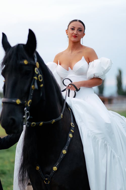 Bride in a Wedding Dress on a Horse