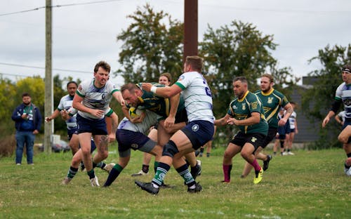 Players Fighting for the Ball During a Rugby Match