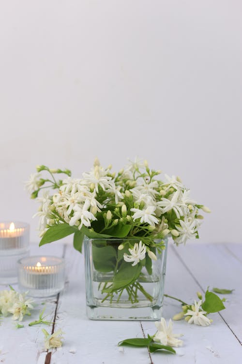 Bouquet of White Flowers and Candles 