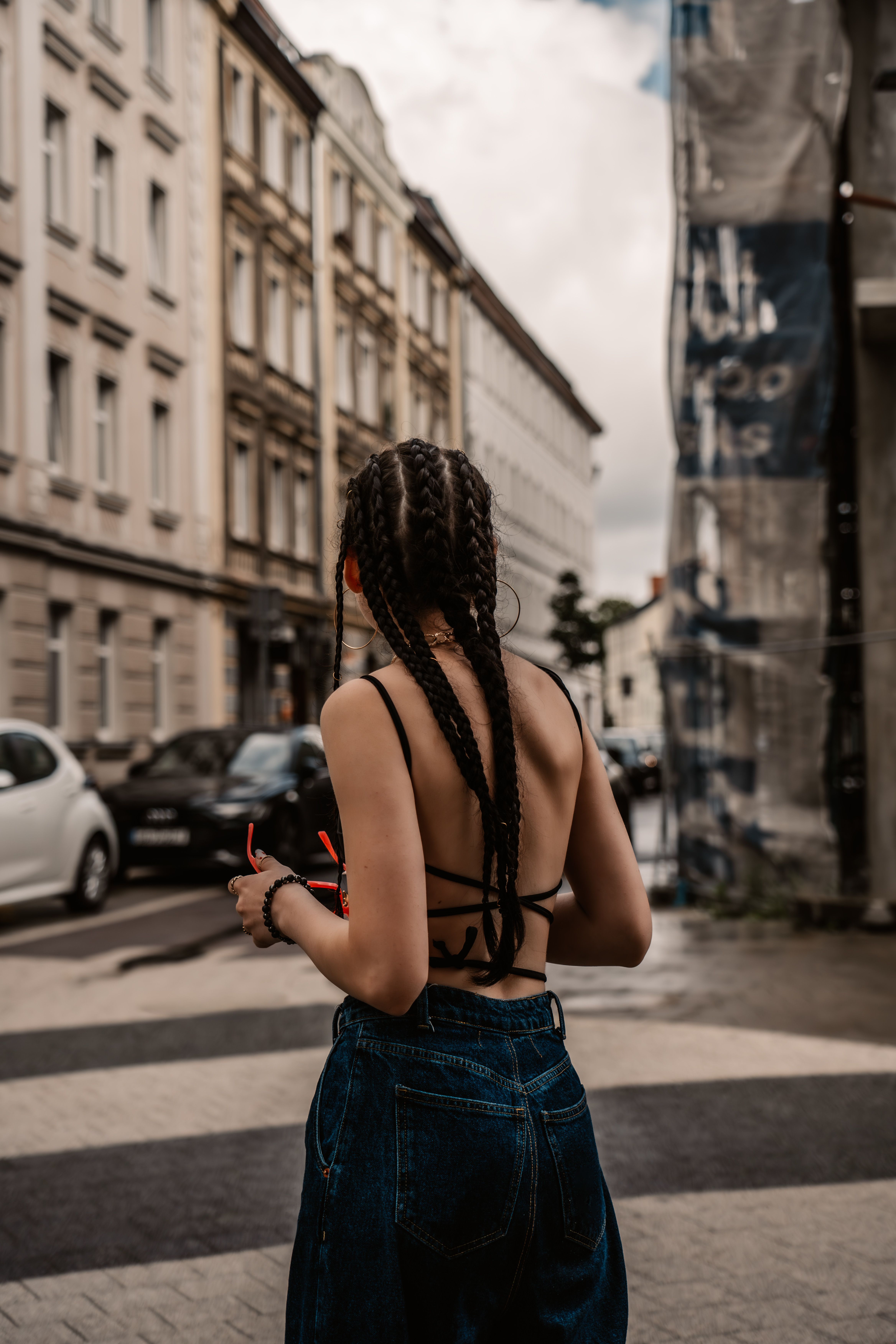 Back View of a Fashionable Woman Walking in City · Free Stock Photo