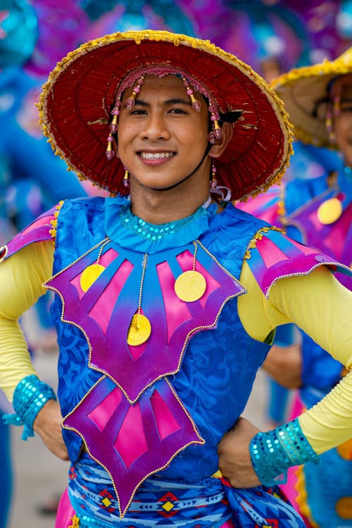 Man Wearing Colorful Costume on a Parade