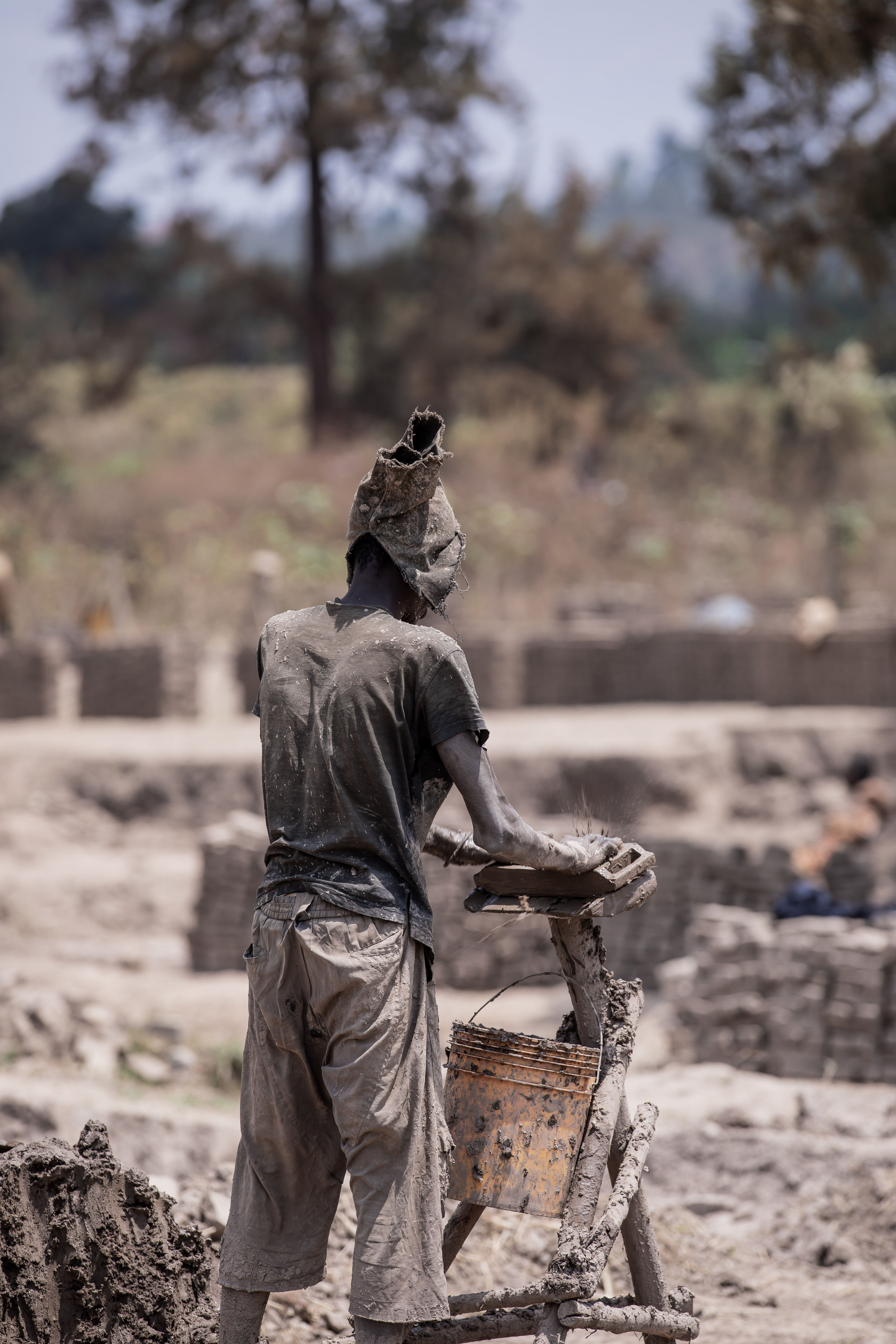 Man Working in Traditional Brick production · Free Stock Photo