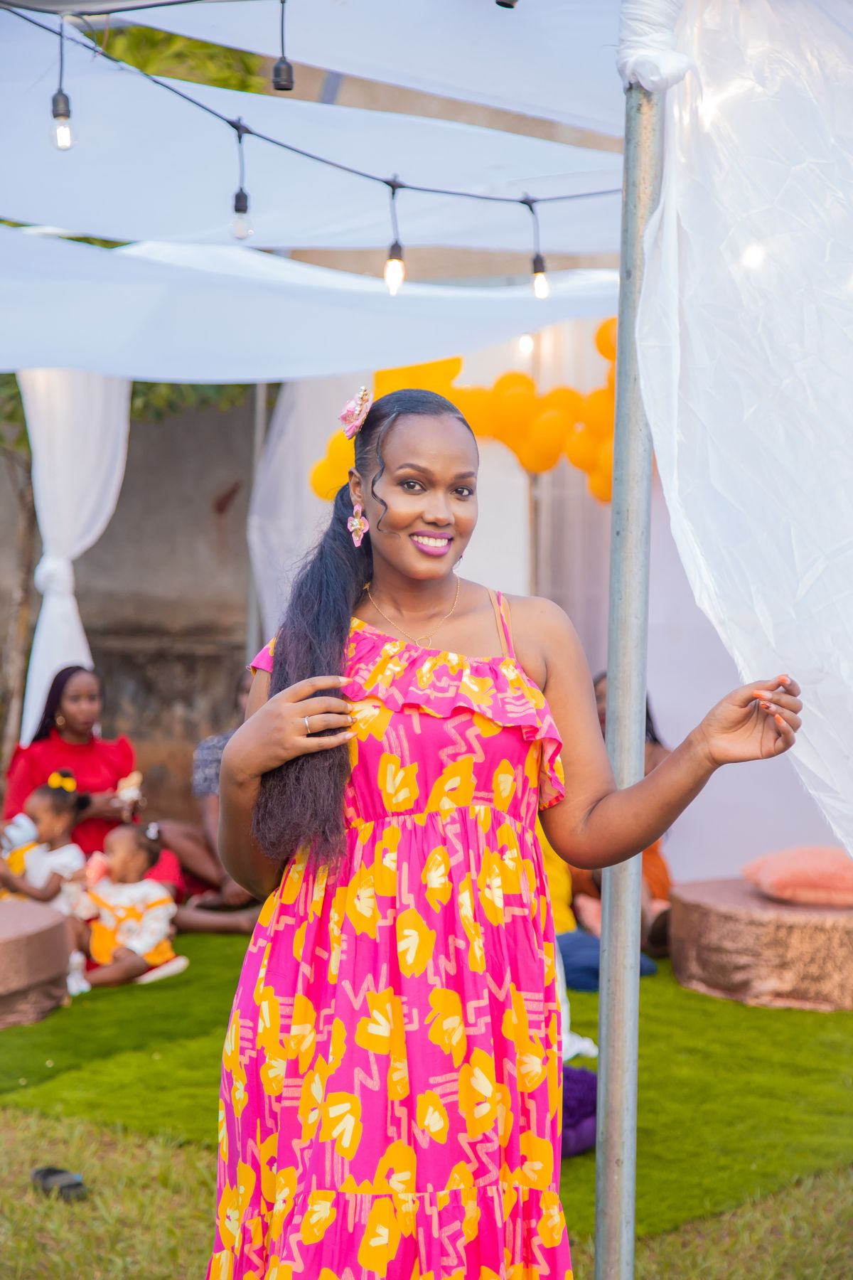 Woman in a silky second-skin slip maxi dress at dusk