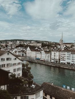 Charming cityscape of Zurich with the Limmat River and historic buildings from Lindenhof.