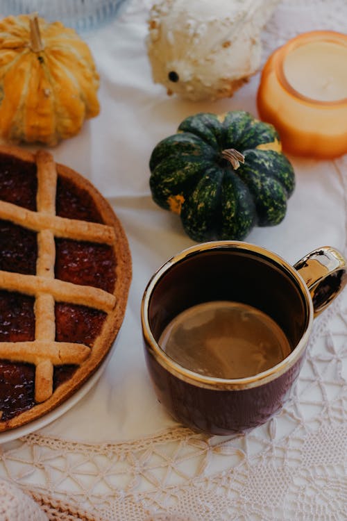 Coffee and Pumpkins on Table