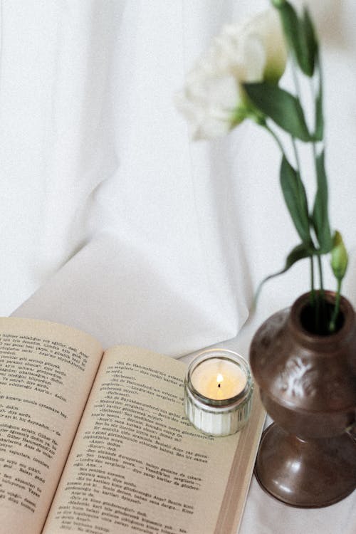 Close up of a Book and a Candle 
