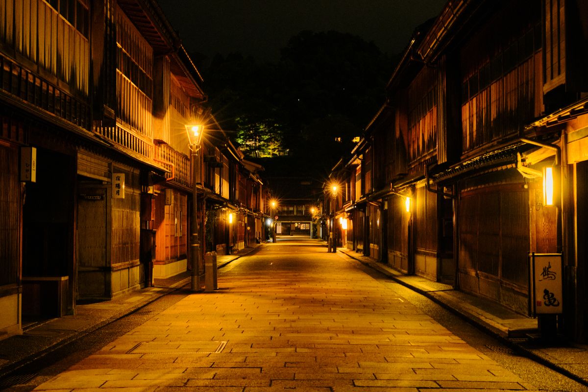 Lantern-lit historic streets of Kanazawa glowing at dusk
