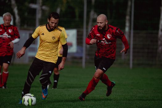 Intense soccer game with players competing actively on the field.