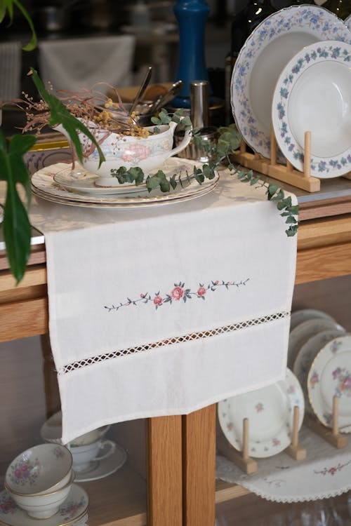 Porcelain on Napkin on Wooden Cabinet