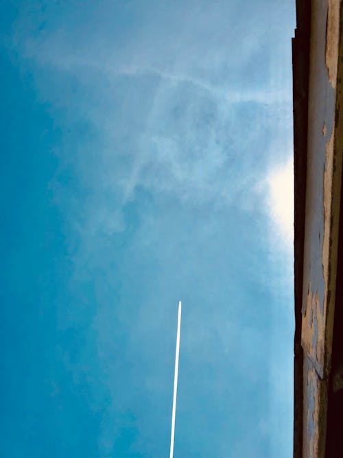 Foto profissional grátis de aeronave, azul, céu azul