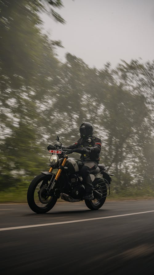 Man on a Motorbike on a Highway