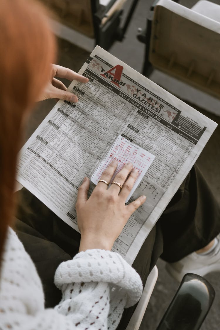 Woman Reading Construction Plans 