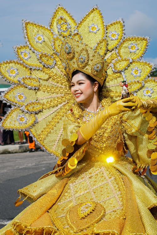Woman Wearing Yellow Costume on a Street Parade 