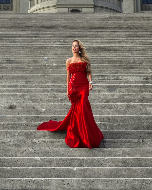 Model in Red Dress on Stairs