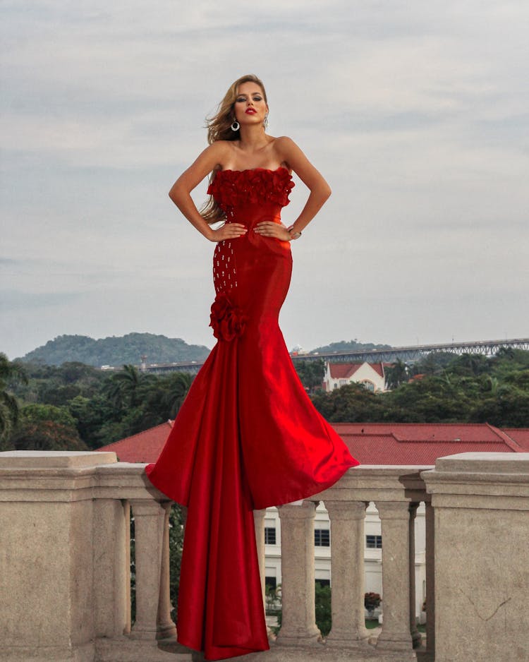 Woman Posing In Red Dress