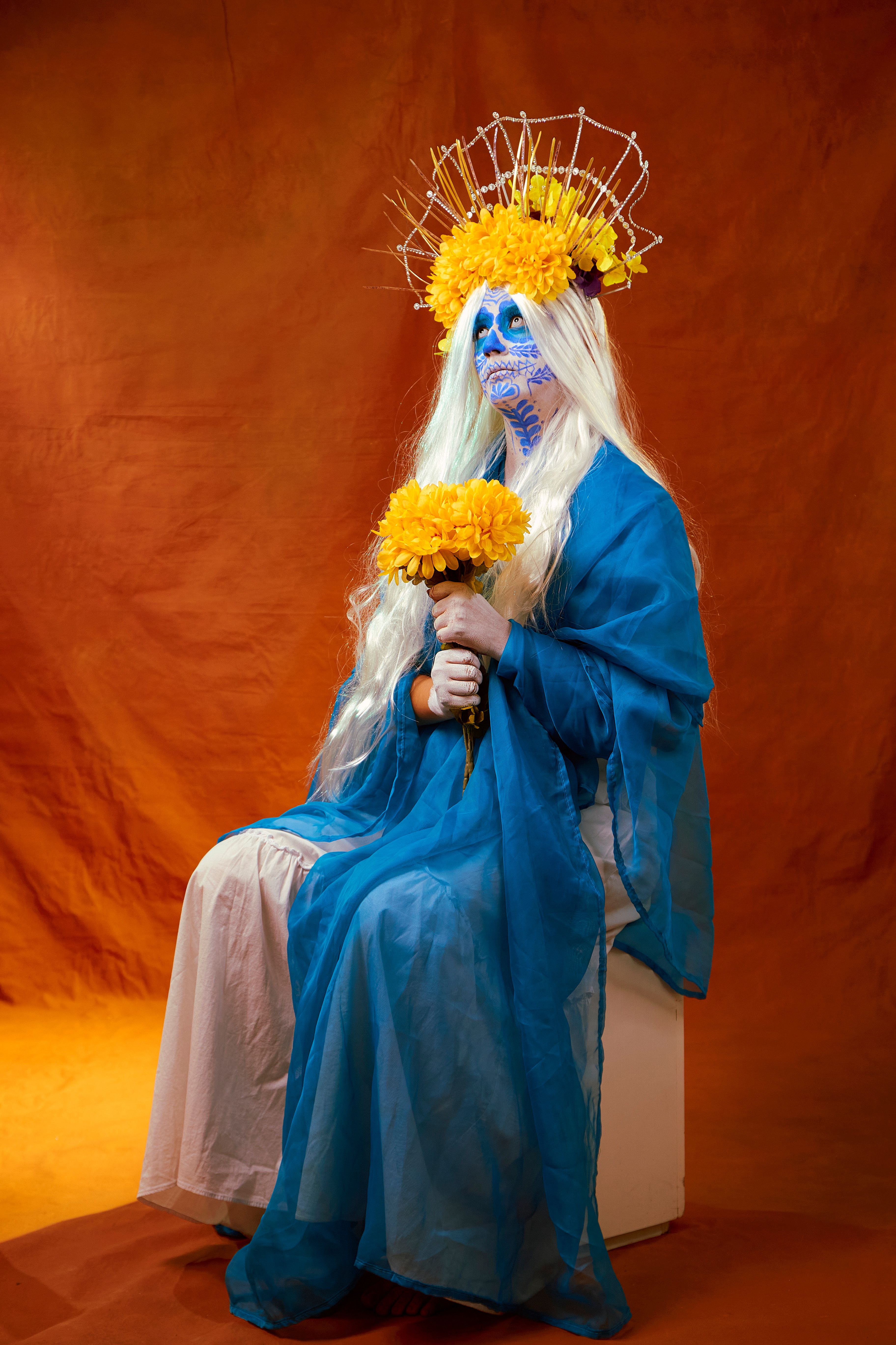 woman-in-a-face-painting-a-costume-posing-in-studio-free-stock-photo