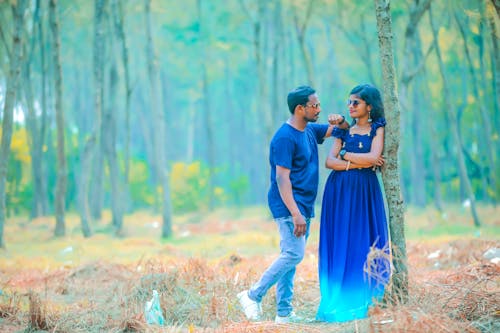 Photo of a Couple in a Forest 