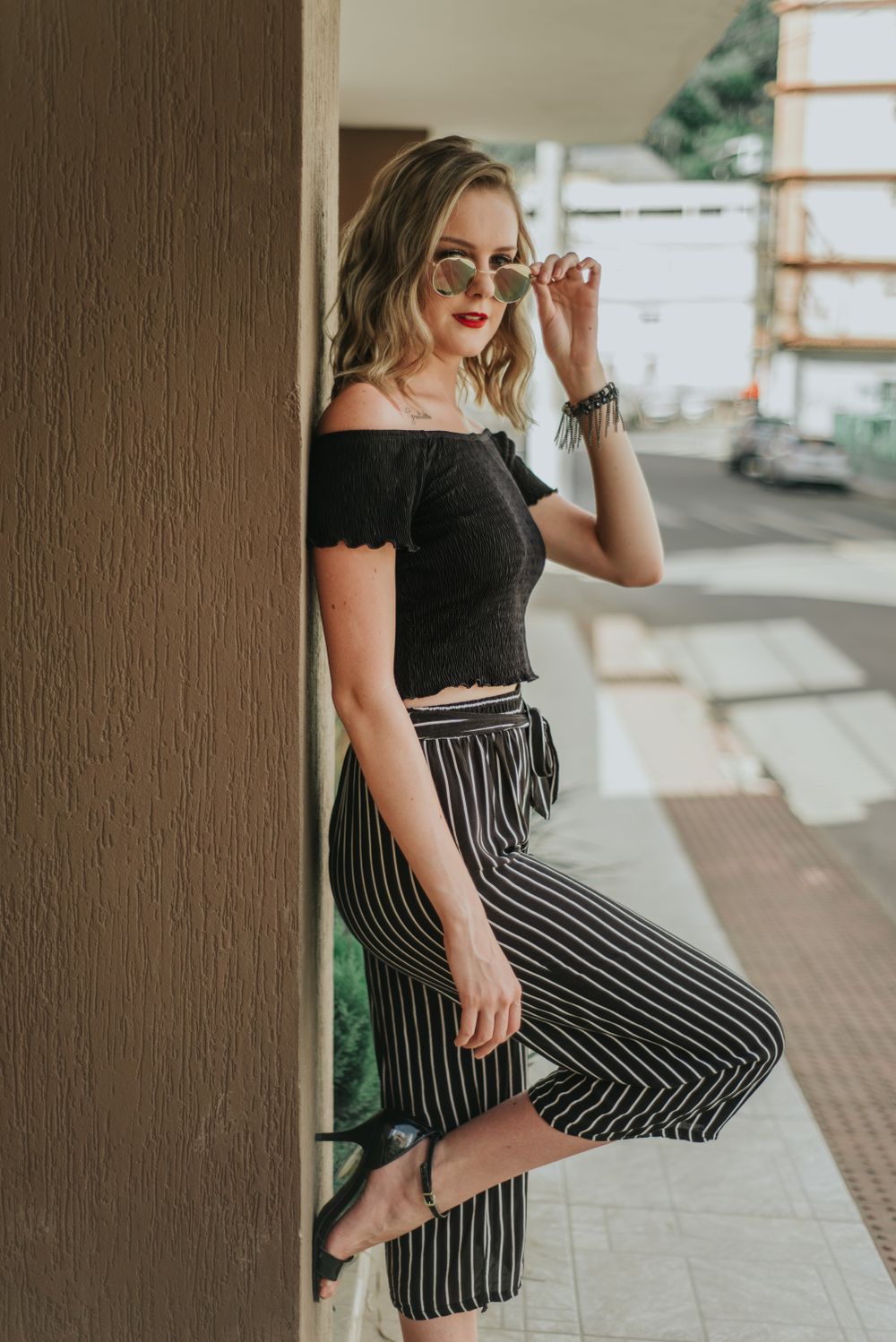 Woman wearing culottes with a casual chic top