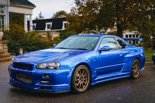 A Blue Nissan Skyline GT-R on the Driveway 