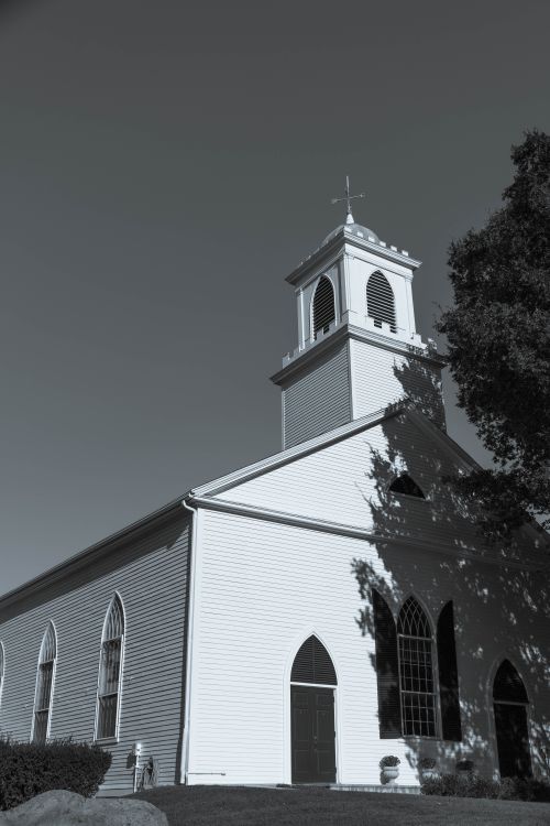 Free Black and white photo of a historic church facade in Rockport, Massachusetts. Stock Photo