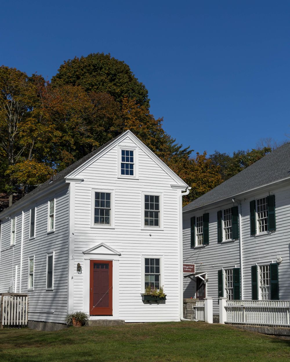 American residential house with painted siding, window trim and shutters