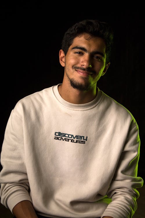 Portrait of a Young Man in a White Sweatshirt 