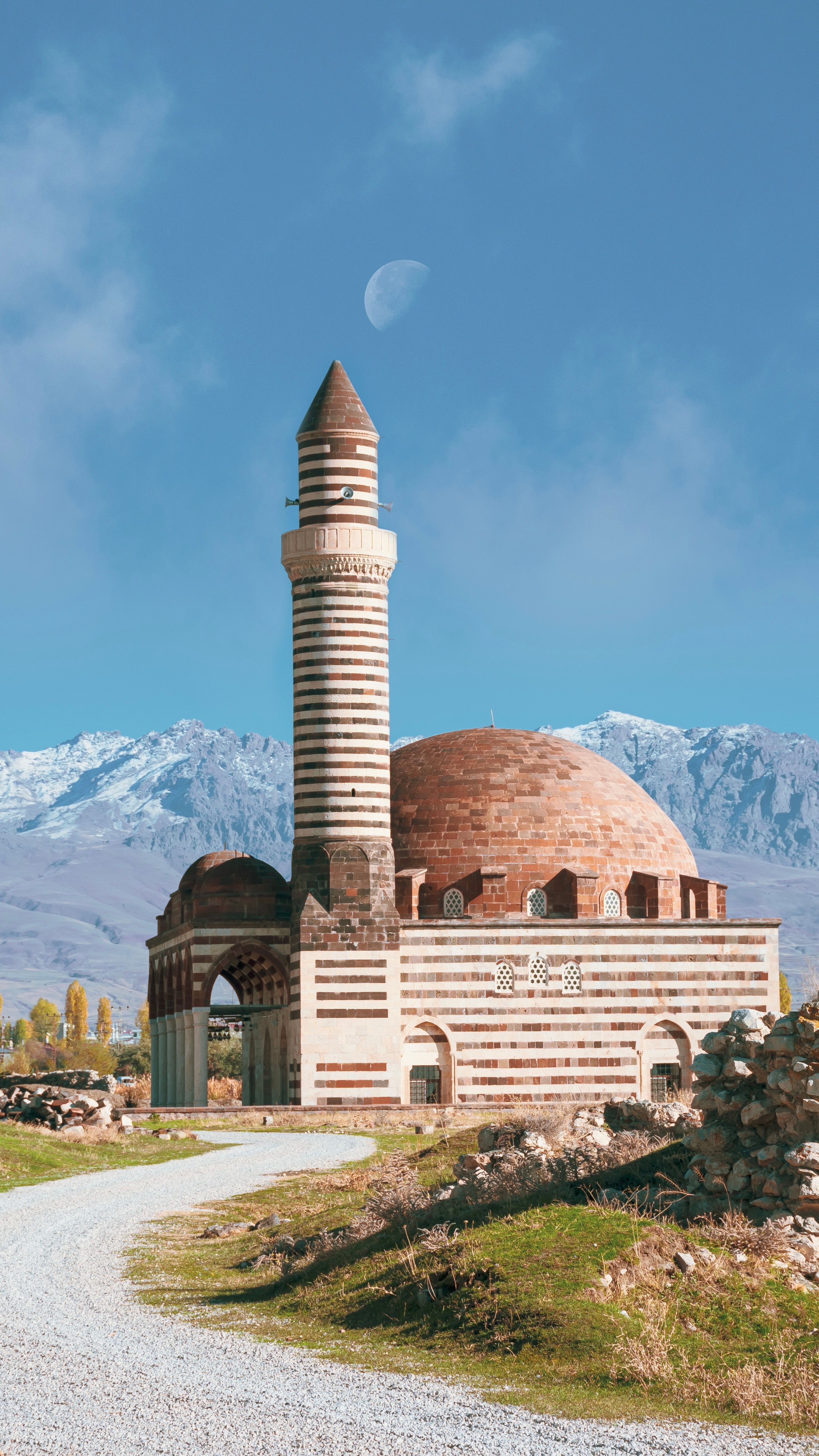 Beautiful view of Kaya Celebi Mosque with mountains in Van, Türkiye.