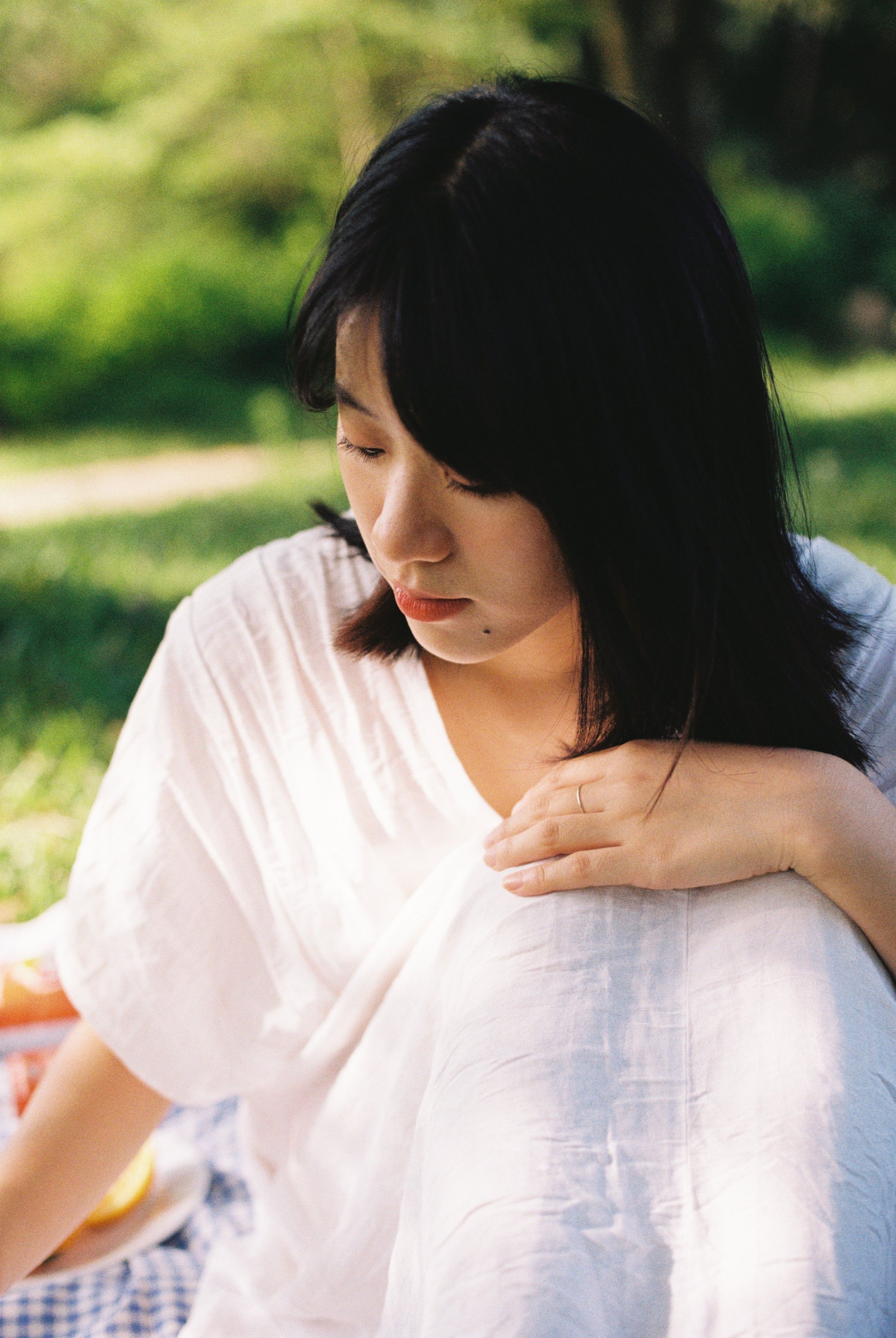 Woman Sitting in a White Dress · Free Stock Photo