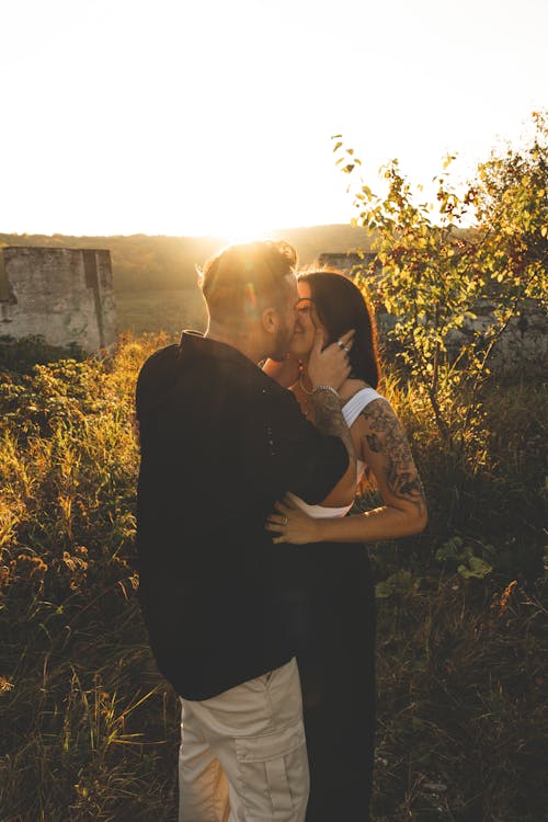 Couple Kissing at Sunset