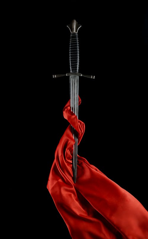 Free Dagger with a Blade Wrapped in Red Silk Stock Photo