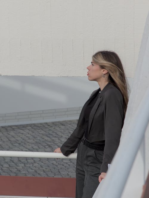 Blonde Woman Posing in Suit 