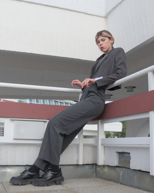 Blonde Woman Posing in Suit 