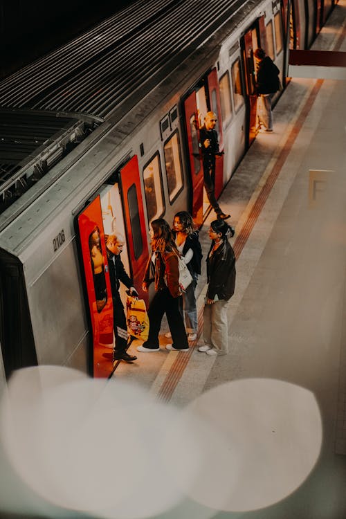 People Entering Metro Train