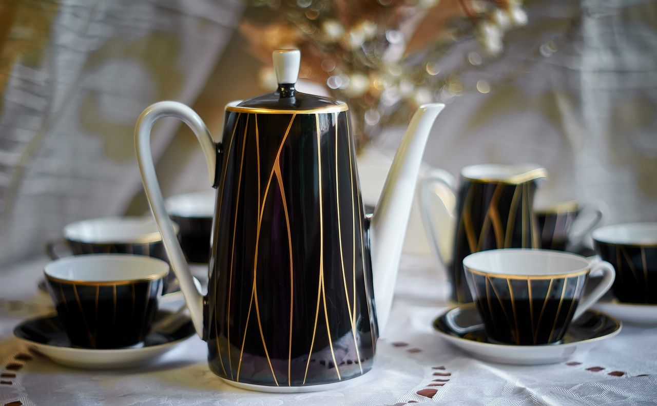 sophisticated porcelain tea set with black and gold design perfect for