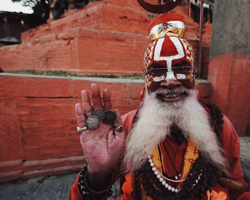 Smiling Man with Gray Beard and in Traditional Clothing