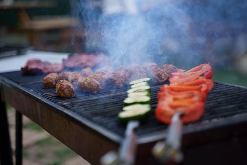 Close-up of Meat and Vegetables on a Grill 