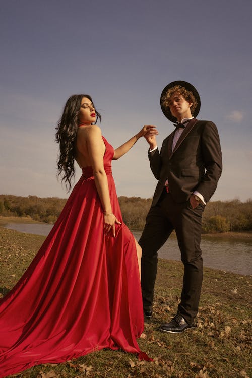 Models Posing in Wedding Dress and Tuxedo