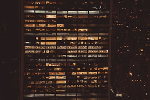 Lights in Windows of Office Skyscraper at Night