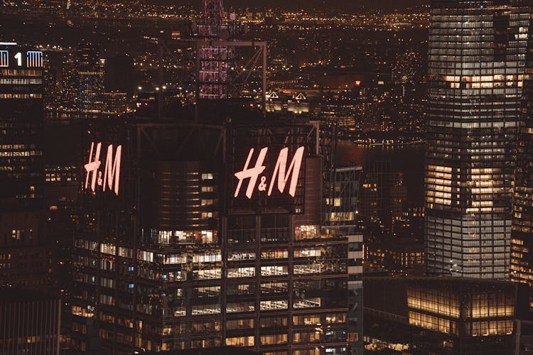 HM Logo In City At Night