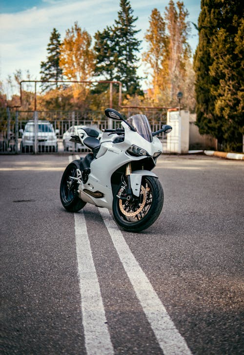 White Motorcycle on Road