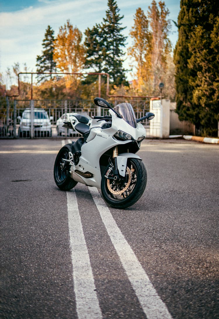 White Motorcycle On Road