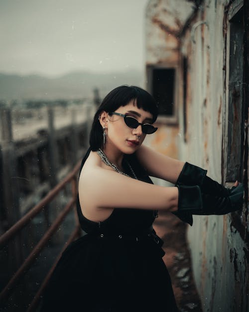 Model in Black Gloves and Sunglasses
