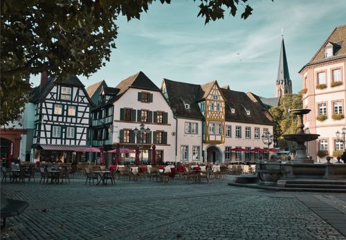 Free Picturesque old town square in Neustadt an der Weinstraße with traditional German architecture. Stock Photo