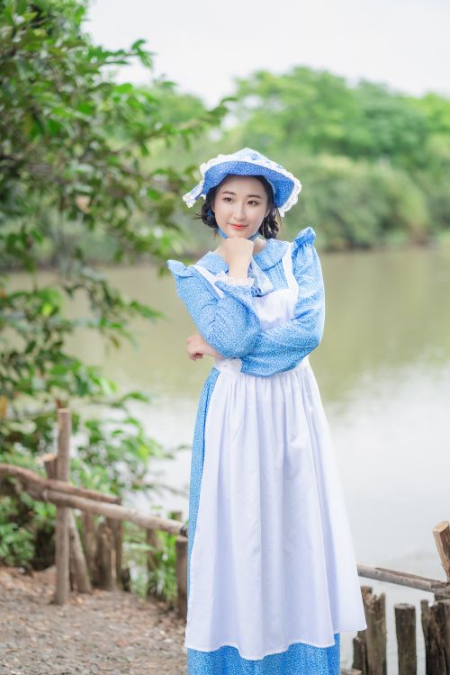 Portrait of Woman in Blue Dress with Apron Free Stock Photo Portrait of Woman in Blue Dress with Apron Free Stock Photo