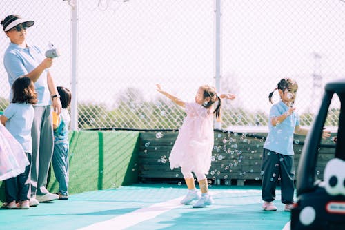 Kids Playing with Bubbles